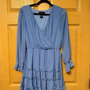 B. Smart Long Sleeve Blue Dress with Ruffle Accents.